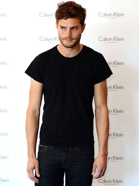 Jamie Dornan in black t-shirt at a Calvin Klein event