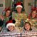 Image 7: A family wrap up in christmas wrapping paper