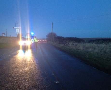 Cley Helicopter Crash Cordon with police car.