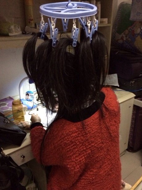 Chinese students use clothes peg to help stay awak