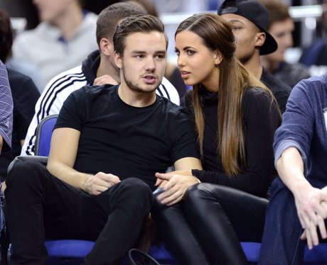 Liam Payne and Girlfriend watching a basket ball game