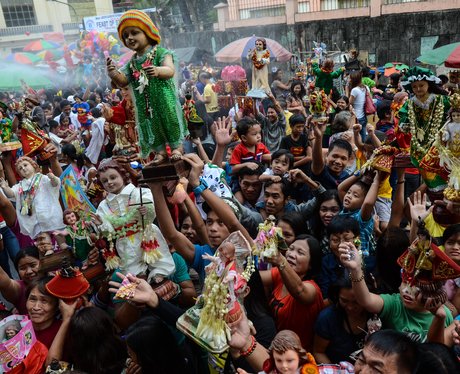 Crowds of people worshipping in the streets