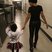 Image 1: beyonce holding blue ivy's hand