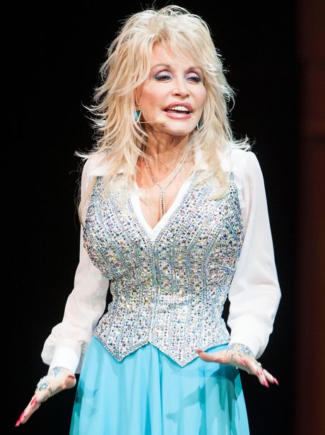 Dolly Parton in a rhinestone suit