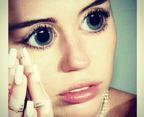 Miley Cyrus with Bratz Dolls eyes
