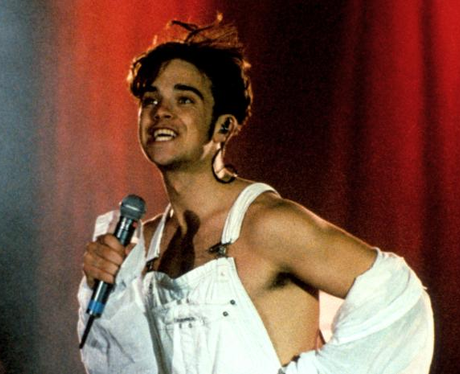 Robbie Williams in dungarees