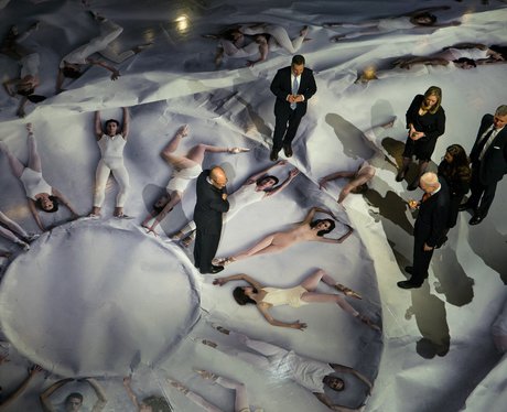 picture of balled dancers lying down
