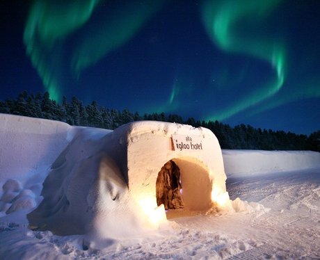 the northern lights about an igloo