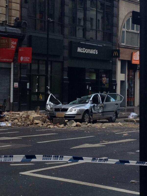 Car crushed in Holborn.