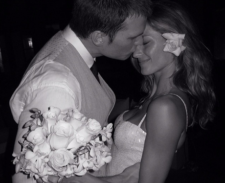Black and white photograph of Gisele Bündchen and Tom Brady on their wedding day