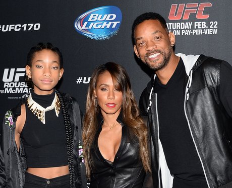 Will Smith in a black jacket with Jada Pinkett-Smi