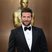Image 9: Bradley Cooper on the red carpet at the Oscars 2014