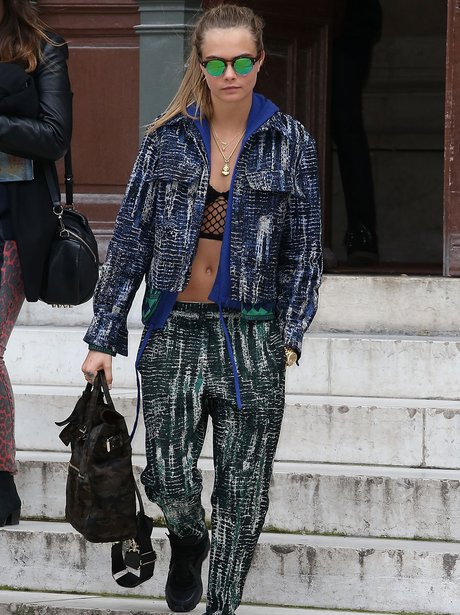 Cara Delevigne in green sunglasses