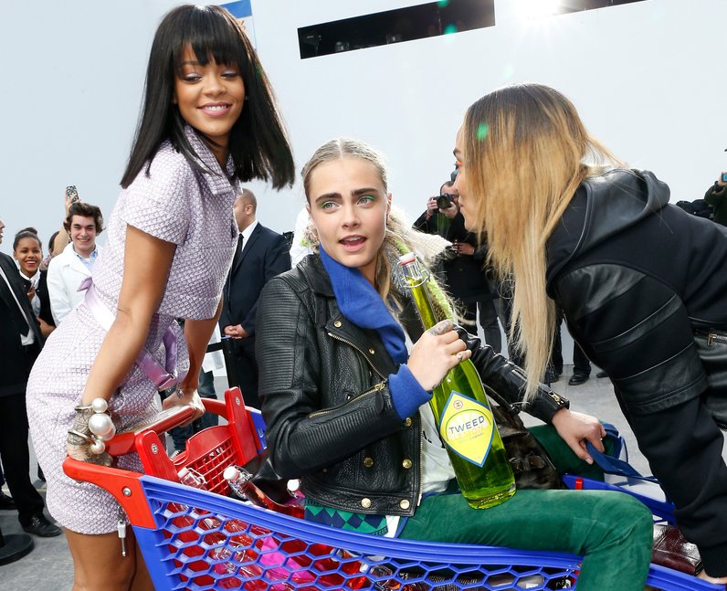 Rihanna and Cara Delevingne muck about in a shopping trolly after the Chanel  show! - - Heart