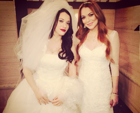 Kat Dennings and Lindsay Lohan in wedding dresses