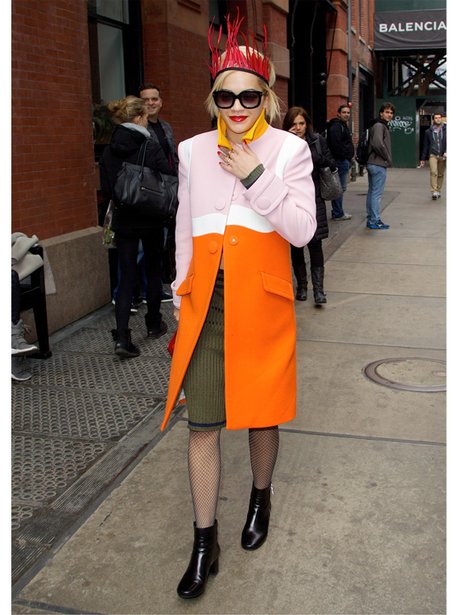 Rita Ora in an orange and pink coat in Soho NYC