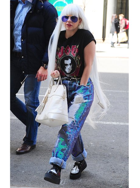 Lady Gaga in jeans and a long blonde wig