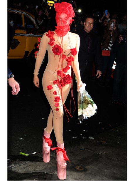Lady Gaga in a nude moph suit and mask