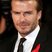 Image 7: David Beckham wears a red ribbon