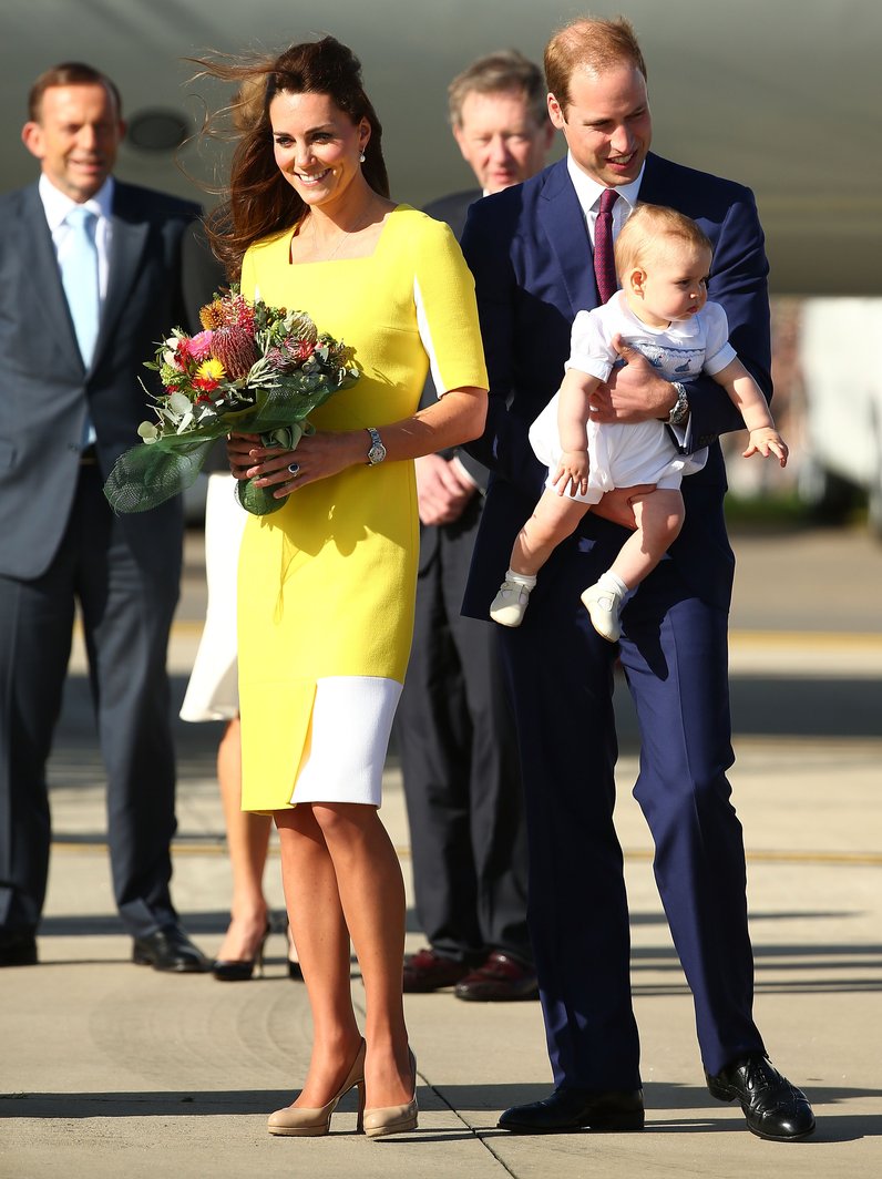Kate is greeted with a bouquet of flowers, and Prince George is ready ...