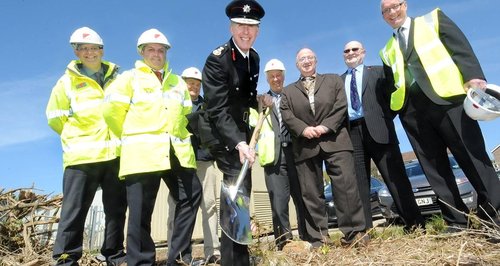 Cornwall's Chief Fire Officer, cuts the turf at t