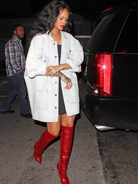 Rihanna is ready to show the world who's boss in thigh high red leather ...