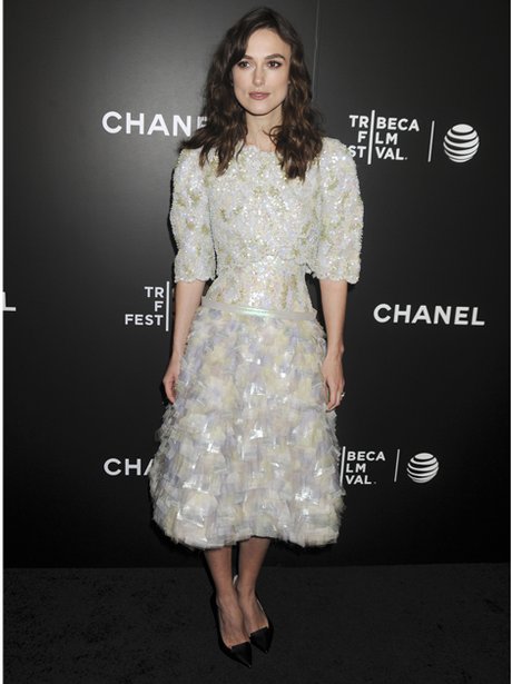 Keira Knightley in a white feathered dress