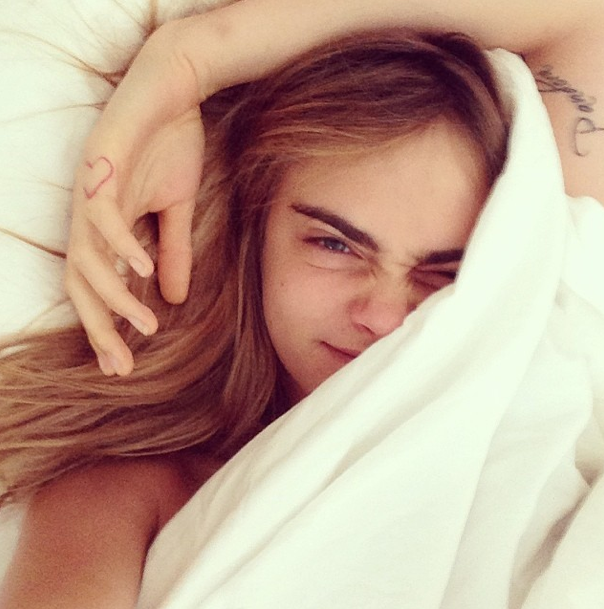 Cara Delevinge in bed without makeup