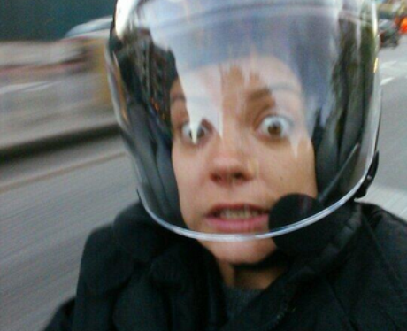 Lily Allen looks scared on a motorbike