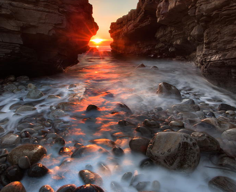 Sunset between two cliffs