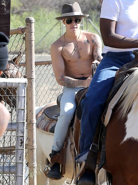Justin Bieber horse riding topless