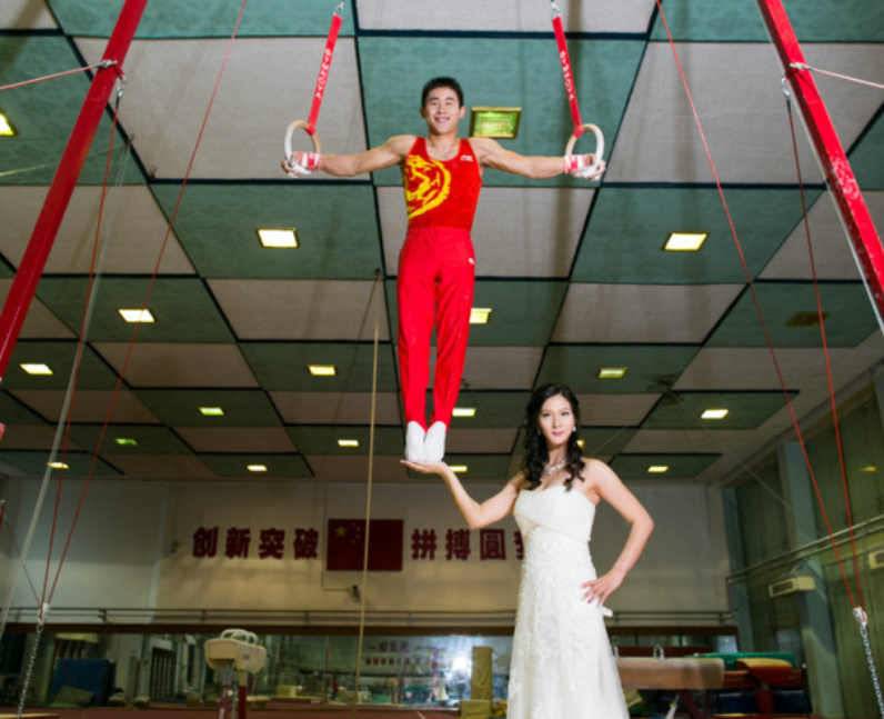 A bride balancing her gymnast husband