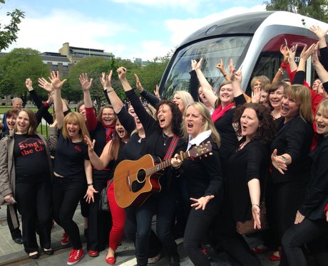 Flashmob choir Sing In The City at the tram launch