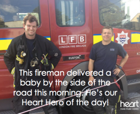 Two firemen by their truck
