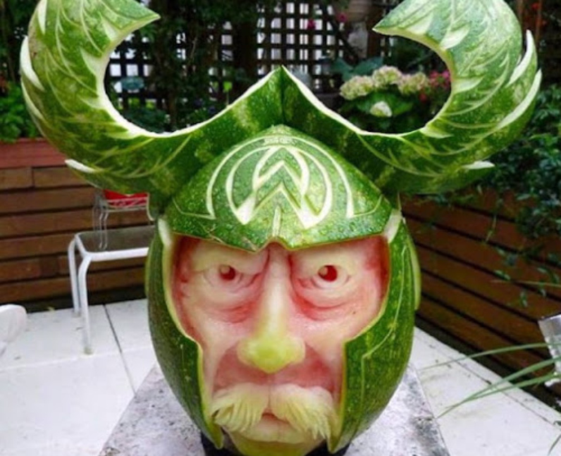 A watermelon carved into a Viking's face