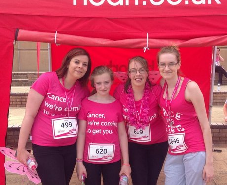 A group of ladies wearing their race for life meda