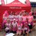Image 10: Group of runners in pink.