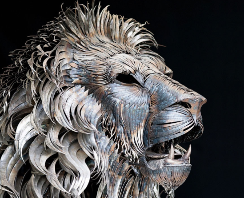 A lion made of scrap metal