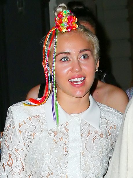 Miley Cyrus with coloutful hair braids