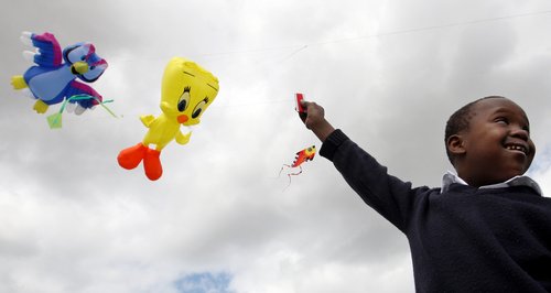 Child with kites