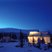 Image 8: A hut set against a snowy backdrop