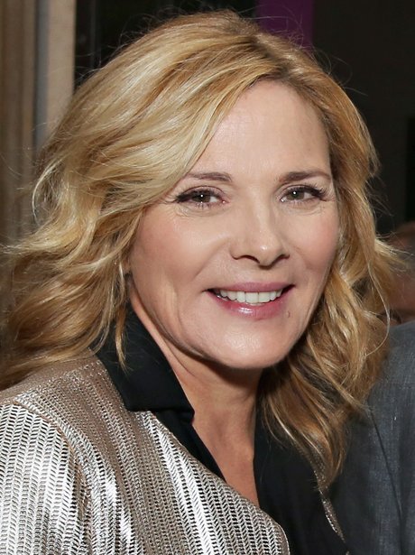 Kim Catrall in a silver jacket