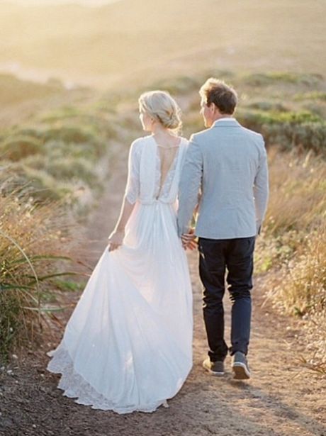 A couple walking in a field