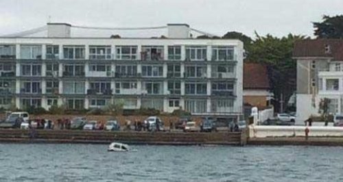 car in water at Sandbanks