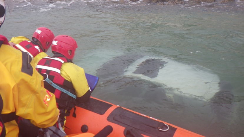 car in water at Sandbanks