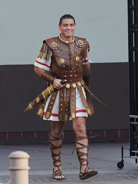 George Clooney on set in costume