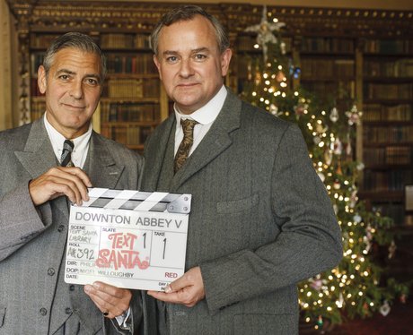 George Clooney with Hugh Bonneville on set