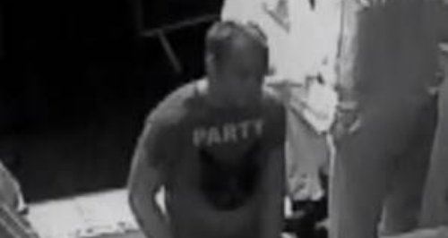 CCTV of a man police would like to speak to in con