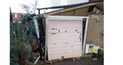 Garage damaged by Harrow mini tornado