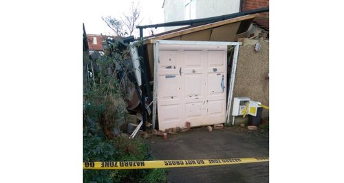 Garage damaged by Harrow mini tornado